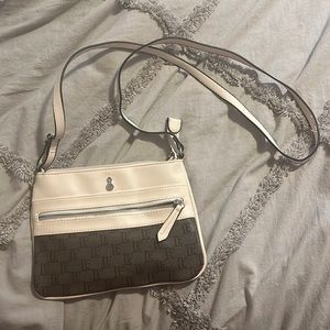 Brown and white cross body purse